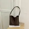 Bolsa para madre e hijo para mujer 2026 nuevo estilo verano sensación de alta gama patrón tejido retro bolso de hombro individual para debajo del brazo bolso cubo para ir al trabajo