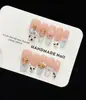 Uñas negras KT medianas ponibles Kitty, suaves y lindas, iluminan el tono de piel, deseo puro femenino, puntas de uñas con diamantes ruborizados fábrica