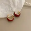 Pendientes de ojo de gato con diamantes geométricos y diseño de nicho de temperamento, populares en Internet, pendientes delgados que combinan con todo.
