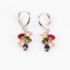Pendientes de moda coloridos Qingxing Mona Lisa pendientes cobre incrustación color AAA circonita cruz fuente transfronteriza pendientes