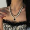Collar de doble capa con perlas negras con costuras de amor para mujer, estilo nicho, ligero, lujoso, estilo frío, colgante para chica sexy, cadena de clavícula dulce y fresca.
