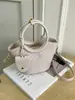Bolso pequeño vintage de alta gama para mujer, nuevo bolso cruzado versátil de moda 2026, bolso de mano exquisito y súper popular, bolso tipo cubo