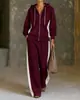 Colección de otoño e invierno 2026 para mujer, transfronteriza, europea y americana: Sudadera con capucha y cremallera de bloques de color y pantalones de pierna ancha, un conjunto informal y deportivo de dos piezas