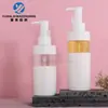 En Stock Venta Directa de Fábrica Botella de Recarga de Loción de 100 ml Bloque de Color de Doble Capa Botella de Loción Corporal PET Cabeza de Bomba de Presión Botella Vacía