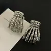 Pinza de Garra de Calavera Gótica para Halloween Estilo Oscuro Plegado Pinza de Cabello de Aleación Parte Posterior de la Cabeza Recogido Pinza de Tiburón Cola de Caballo Accesorios para el Cabello