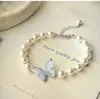 Pulseira Pérola Borboleta Azul Gelo Triturado Luxo Leve Francês Exquisita de Alta Qualidade Pulseira Feminina de Nicho Elegante Versátil Doce