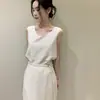 Tallas actualizadas: Conjunto elegante de top sin mangas de verano nuevo estilo coreano + falda con cinturón para mujer 2026