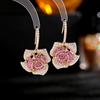 Pendientes de estilo industrial pesado europeo y americano para mujer, con una atmósfera exagerada, microincrustaciones de circonita, a la moda, con ganchos para la oreja distintivos, pendientes de camelia tridimensionales.