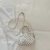 Bolso tipo almohada liso de estilo coreano casual, 2026 nuevo de moda y elegante con lunares, de alta apariencia, bolso cruzado único