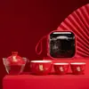 Juego de té de viaje festivo traje portátil pequeño burbuja seca al aire libre Kung Fu Taza Express de lujo ligero de alta gama una tetera tres tazas