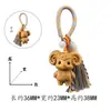 Estilo creativo madera maciza tallada estilo Tang Zodiaco Chino sándalo dorado colgante llavero decoración bolsa artesanía de madera
