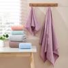 Set de toallas de baño de celosía catiónica auspiciosa al por mayor para comercio exterior, vellón coral de color liso, simple para el hogar, toalla para pareja