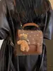 Yaozi 2026 principios de otoño nueva moda mochila simple para mujer bolsa escolar para estudiante bolso de hombro cruzado versátil y elegante
