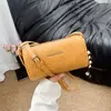 Bolso de mujer Shuai Mi Jia con patrón tejido retro 2026 nuevo de moda de principios de otoño, bolso cruzado, bolso de hombro, bolso de axila, bolso cilíndrico