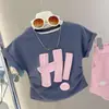 Camiseta Infantil Verão Estilo Coreano Estampada Infantil Slim Fit com Cordão Cor Sólida Infantil Manga Curta Distinta Moda Meia-manga Versátil