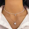 Collar Clavícula Retro Francés de Imitación Perla con Borla de Corazón de Tres Capas Apilable Europeo y Americano Nicho Temperamento de Gama Alta para Mujeres