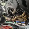 Aplicável à modificação do tubo de escape da motocicleta Qianjiang race 800 race 600RS para contrapressão para seção frontal de três vias calibre original