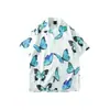 Cuello de solapa 2026 Estilo nuevo Camisa floral para hombre Estilo coreano Holgada Moda Estampada Estilo playero Casual Camisa de manga corta Exportación