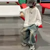 Jeans para Niños Primavera y Otoño 2026 Nuevo Estilo Otoño Moda Salpicaduras de Tinta Denim Pierna Ancha Pantalones Largos Niños Medianos y Grandes Transfronterizos Modernos