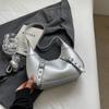 A bolsa popular deste ano para mulheres 2024 nova primavera e verão nicho design ombro mensageiro saco grande capacidade all-match bolinho saco