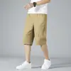 Pantalones cortos de algodón para hombre de mediana edad, pantalones cortos de algodón de papá, pantalones casuales finos de verano, pantalones de playa holgados de talla grande, pantalones de longitud media