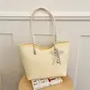 2026 Bolso de mano tejido nuevo con lazo de encaje de perlas, gran capacidad, bandolera, estilo coreano, bolso de mano para el día a día