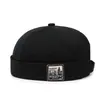Sombrero de piel de melón sin ala con etiqueta de tela de nuevo estilo para primavera y otoño, para hombres y mujeres, estilo hip-hop coreano, estilo callejero, estilo retro