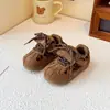 Zapatos infantiles estilo coreano, nueva colección otoño 2026: Zapatillas de entrenamiento alemanas para hombre con estampado de leopardo, retro y versátiles, y zapatillas deportivas casuales para mujer
