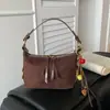 Bolsa Tote Casual Retrô de Grande Capacidade Feminina 2026 Novo Estilo Moda Sensação de Alto Padrão Trabalho Deslocamento Bolsa de Ombro Transversal
