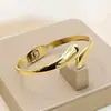 Pulsera Metálica Personalizada Estilo Europeo y Americano, Pulsera Lisa de Acero de Titanio en Forma de Gota con Diseño de Resorte Abierto, Joyería de Mano para Mujer que no se Desvanece