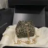 Bolso tipo cubo de pana con cordón estilo coreano para mujer, con decoración de perlas y cadena, mini bolso cruzado de cordón estilo vintage