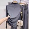 Camisa básica negra de cuello medio alto para mujer, otoño e invierno 2024, elegante y moderna, de punto con hilo y manga larga.