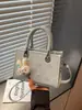 Bolso de Mano para Trabajar y Viajar Estilo Coreano Transfronterizo, Gran Capacidad, Bolso Cuadrado Pequeño de Moda Nueva, Textura Simple, Bolso de Hombro Casual