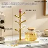 Soporte amarillo con diseño de Patricio Estrella para uso doméstico, un portavasos de alta gama y lujo ligero para tazas y vasos de agua, estante de almacenamiento de escritorio