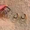 Pendientes de borlas de lujo ligeros y de alta gama para mujer, diseño elegante de nicho, nueva moda 2025, pendientes exagerados y distintivos.