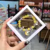 Libro Caperucita Roja Mismo Estilo Estudiante Pulsera de Glaseado de Palomitas de Maíz Hecha a Mano con Cuentas Dibujos Animados Cristal Pulsera Infantil Venta al por Mayor Cajas de Regalo