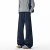 Diseño de corte inclinado estilo americano, pantalones deportivos de retazos para hombre, ligeramente acampanados, bordados, pierna recta, casual, corte holgado, retro moderno de otoño