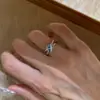 Anillo de Diamante Azul Entrelazado Brillante para Mujer, Diseño de Nicho, Popular en Xiaohongshu, Anillo Abierto de Cruz Retorcida para Mujer