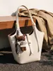 Bolso cruzado para mujer 2026 Diseño de nicho Bolso de axila francés Bolso de mano de alta gama Bolso de hombro retro a la moda para el trabajo