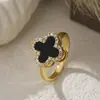 Diseño de Nicho Europeo y Americano Anillo Abierto Giratorio con Forma de Trébol de Cuatro Hojas Microincrustado de Circonita Acero Inoxidable Collar de Flor para Mujer
