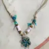 Collar con colgante de campana de mariposa de cerámica de estilo étnico retro para mujer, diseño nuevo y moderno, cadena larga para suéter, accesorios
