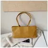 Bolso tote nuevo estilo relajado para principios de otoño de 2026, bolso de hombro de gran capacidad para el trabajo, bolso de mano simple, elegante, de alta apariencia