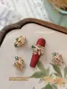 Novos acessórios de arte para unhas em esmalte cloisonné estilo chinês, apresentando fênix em esmalte azul, franjas, pérolas e designs florais, atacado para decorações de unhas tradicionais