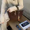 Bolsa Retrô Fashion para Mulheres 2026 Nova Pequena de Nicho para o Dia a Dia Bolsa de Ombro Único Bolsa Transversal Casual Fosca
