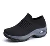 Comercio electrónico transfronterizo al por mayor zapatos de mujer talla grande zapatillas con amortiguación de aire tejido fly zapatos calcetín zapatos casuales de comercio exterior