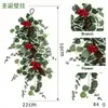 Colgante de pared navideño de producto nuevo transfronterizo, flor de Nochebuena, ramas de pino y decoraciones de bayas para decoración festiva al por mayor, colgante de pared navideño artificial