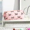 Novo Estojo de Lápis Estudante Grande Capacidade com Laço Pequena Bolsa de Armazenamento Floral Estilo Ins Portátil Coleção de Mesa Caixa de Papelaria