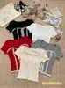 33066 # Top de Verano Estilo Francés Cuadrado de Encaje Puro Manga Corta Ajustado Diseño de Moda con Sensación de Empalme