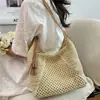 Bolso Tote Grande de Paja Tejida Hueca para Vacaciones en la Costa, Bolso de Hombro Único, Nuevo Bolso Cruzado de Playa Primavera/Verano 2026