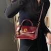 Bolso de mano retro con textura para mujer, estilo otoño e invierno, nueva moda, fácil de combinar, diseño informal, bandolera de hombro, venta al por mayor
